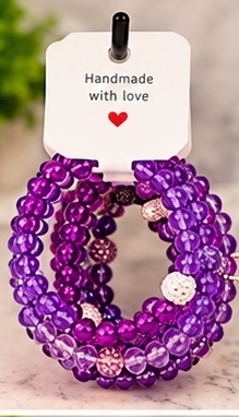 Bracelet 07 shown completely on its handmade display card