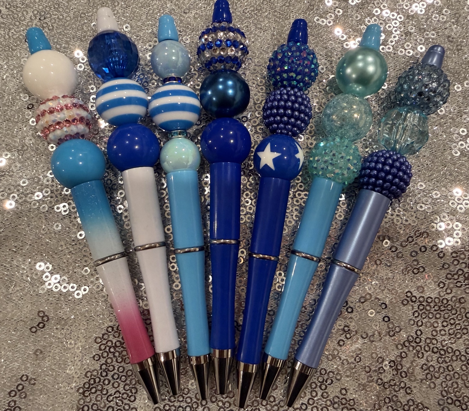 Complete collection of blue and turquoise handmade beaded pens